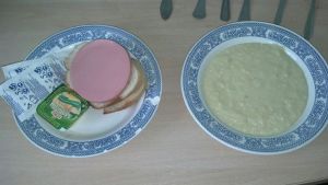 Breakfast.  Oatmeal, some kind of bologna and two pieces of bread with butter.