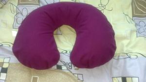 A head pillow is a MUST!  I got this one at Target for $6.  It is inflatable, so, it fits in your luggage.